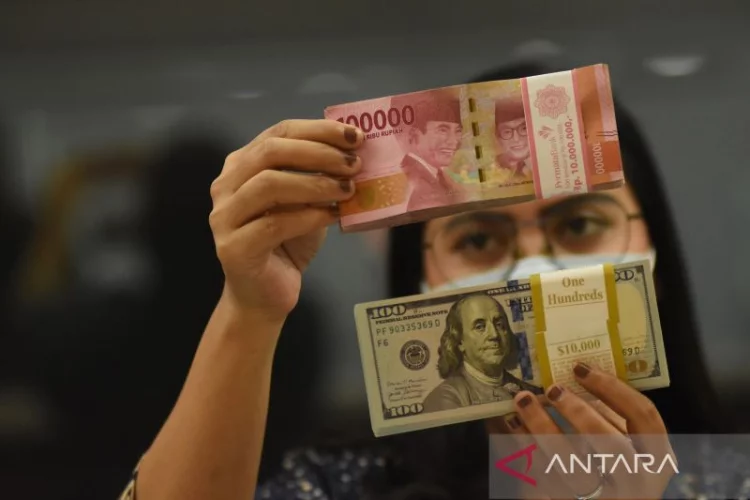 Rupiah Jumat pagi melemah tipis 2 poin ke posisi Rp14.328 per dolar AS