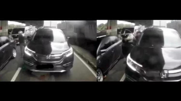Asyik Main HP, Pengendara Mobil Jadi Korban Jambret di Tengah Kemacetan