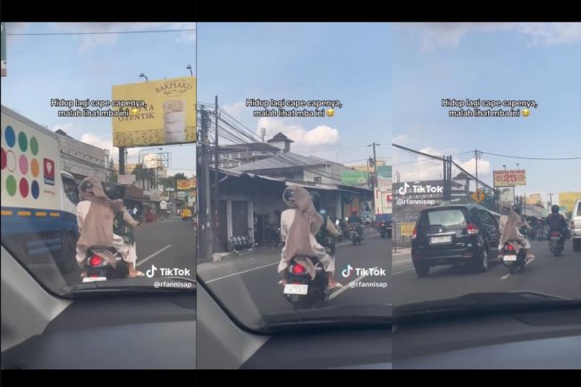 Pakai Helm saat Naik Motor, Jilbab Wanita Ini Berkibar-kibar