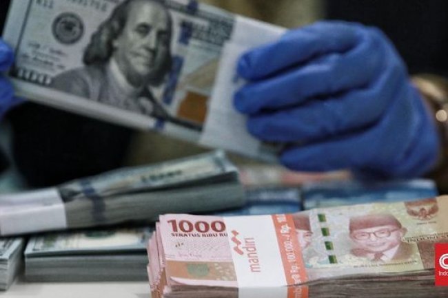 Rupiah Menguat Tipis ke Rp15.605 Menanti Hasil Rapat The Fed