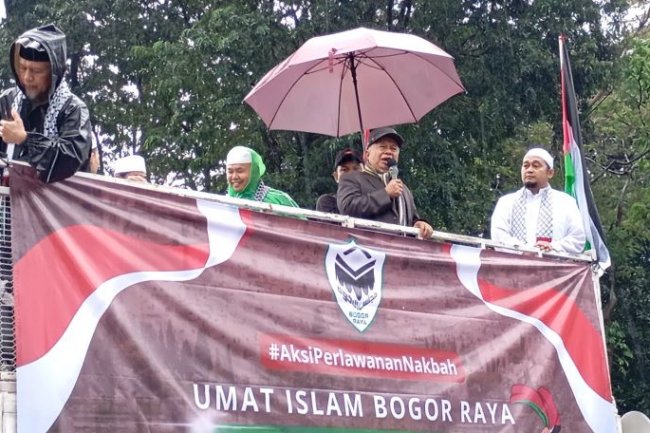 Dalam Guyuran Hujan, KH Muhyiddin Junaidi Orasi Ungkap Kekejaman Israel Sejak Peristiwa Nakba