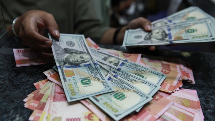 Prediksi Rupiah Usai Moody's Pangkas Peringkat Utang AS